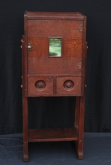 Arts and  Crafts Liquor or Smokers cabinet. Original finish. Shop of the Crafters style. Stickley era.